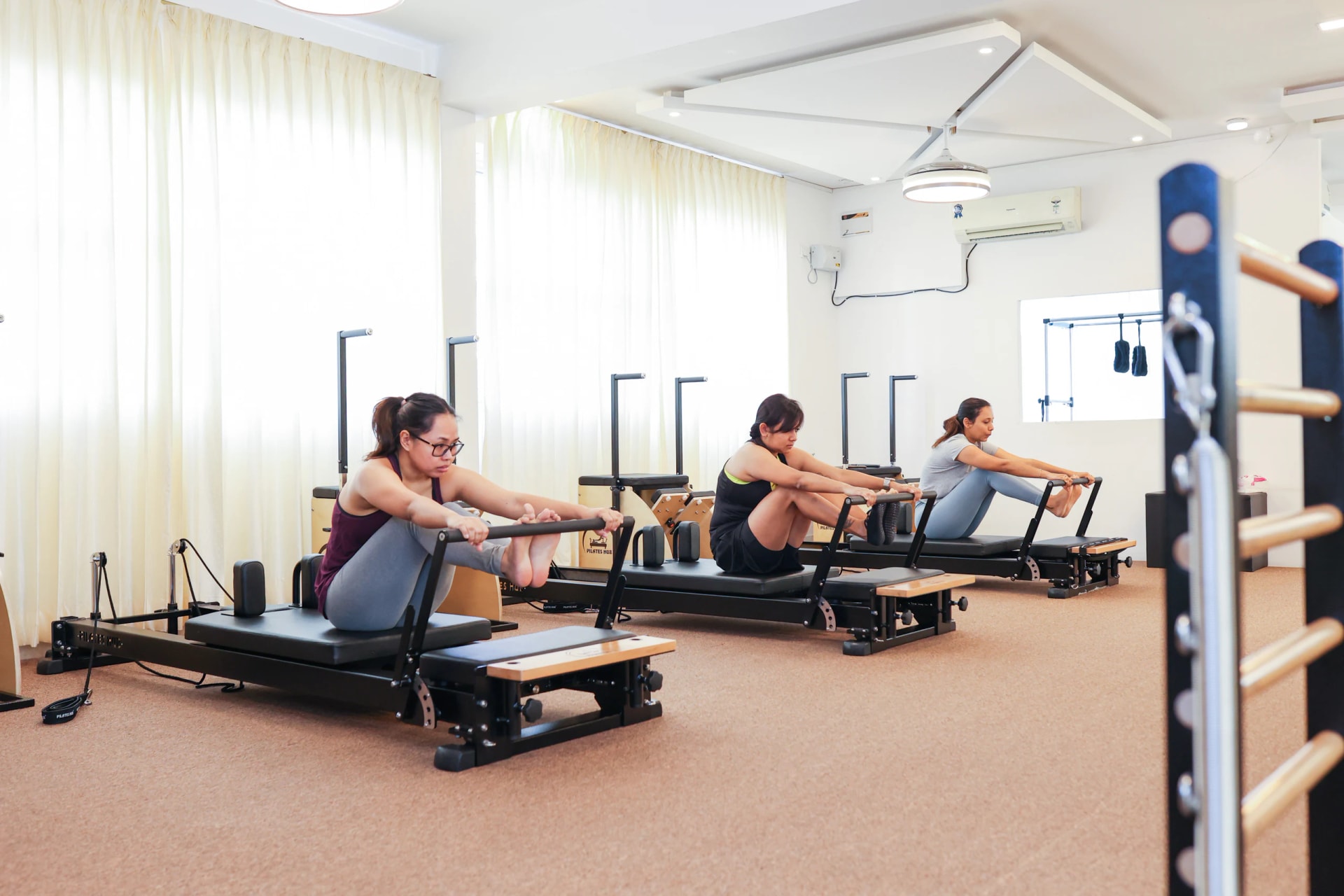 Poised, controlled Pilates movement